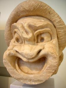 Stone caricature of an ancient theater mask