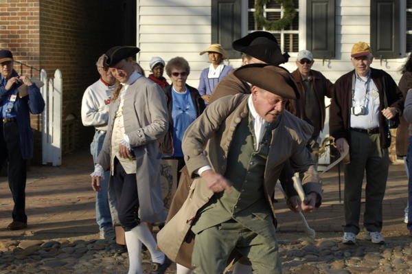 A Guy getting thrown out of the Tavern in Williamsburg
