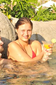 Enjoying the sun, pool and my mango cocktail