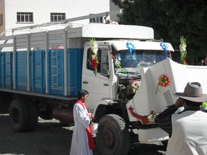 Priest Blessing a Truck!