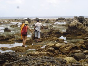 walking through the coral beds during low tide