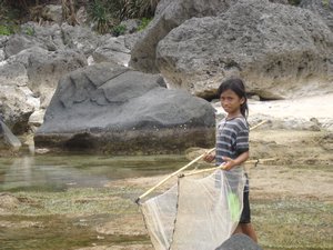 Young Ivatan girl with her fishnet