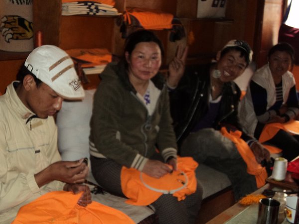 differently-abled Tibetan youths working on some crafts