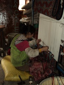traditional carpet weaving using the loom