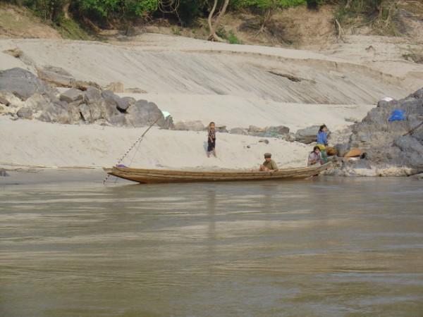 Laotians on the river bank