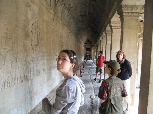 Viewing the bas reliefs of Ankor Wat