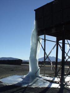 Frozen water on the tank used to fill trains in a town on the border of the Salt Flats.