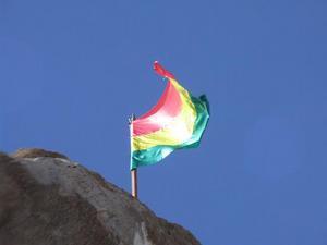 Bolivian flag against the sky on cactus island.