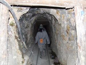 Walking down the mine tunnel.