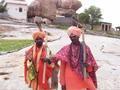 two guys earning rupees
