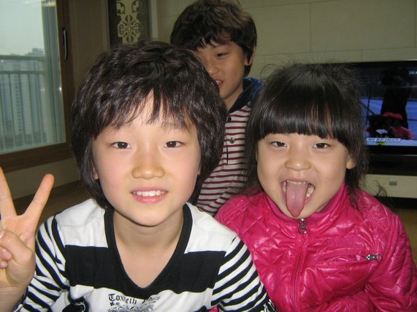 One of the boss's kids and 2 other random kids. 