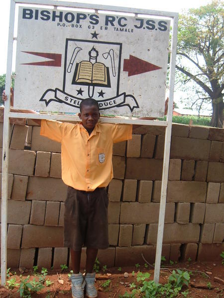 Hardi with his school signboard