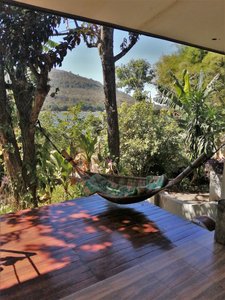 View from Nicholai's veranda. Note the hammock made from a single, extremely artfully crafted, length of bamboo.