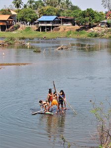 Kids on improvised raft.