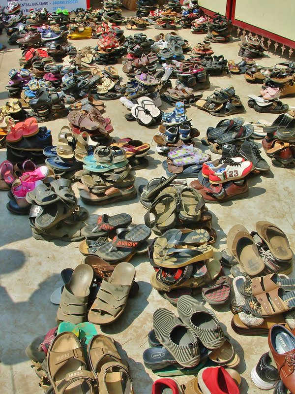 128 Shoes outside temple