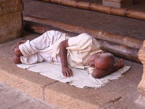 Devotee sleeps in a Trichy temple