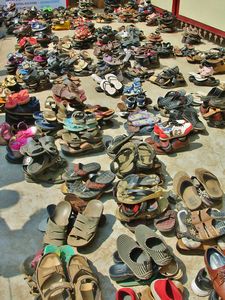 128 Shoes outside temple