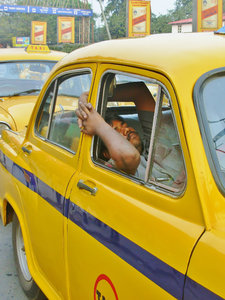 Sleeping Kolkata taxi driver