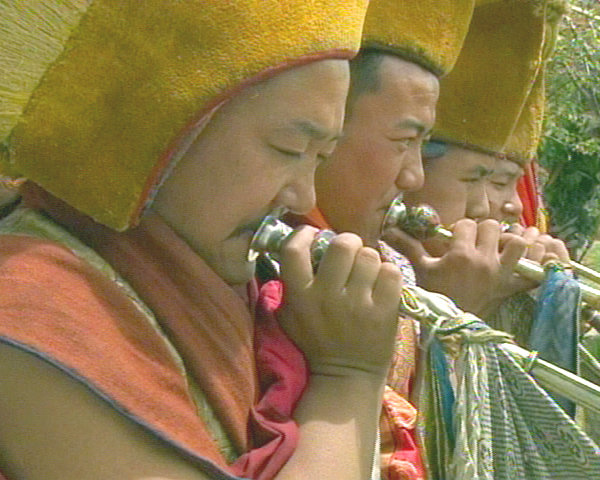 Yellow Hat Monks Blowing Horns