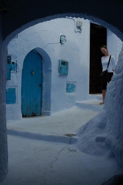 Manuela in Chefchaouen streetscape