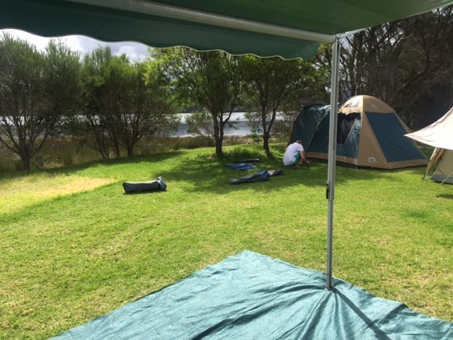 Hayden putting up his tent room with a view