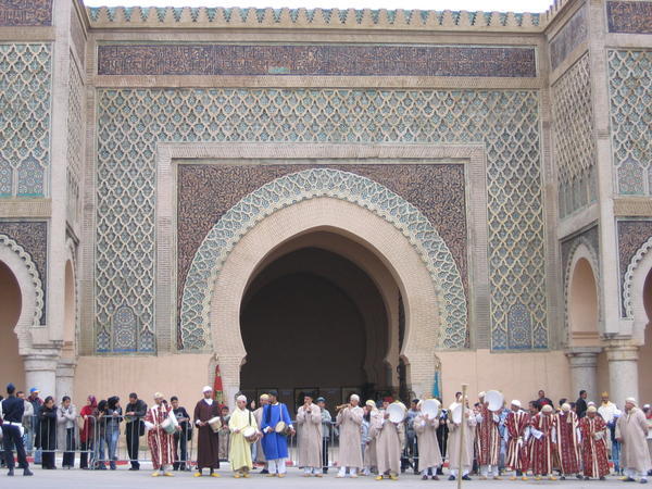 A colorful crowd outside the main gate