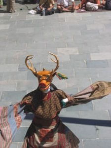 Masked deer dancer