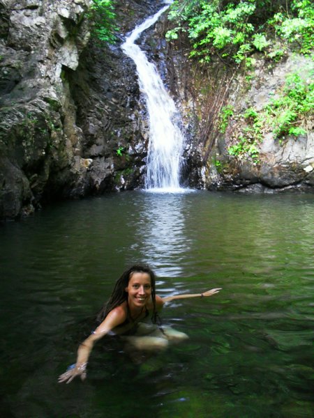 Swimming by the waterfall