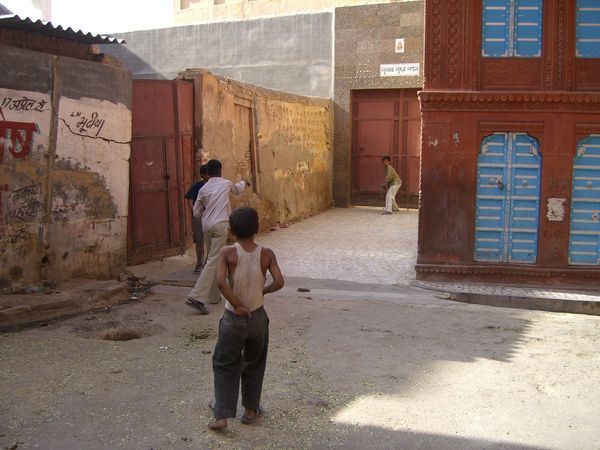 Bikaner locals playing the nationally adored cricket amongst the haveli's