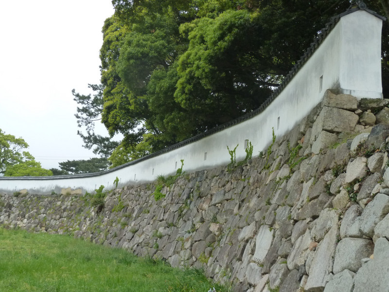 Wall with holes where people placed rifles to protect Hagi Castle