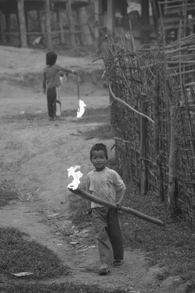 Children And Flaming Torches