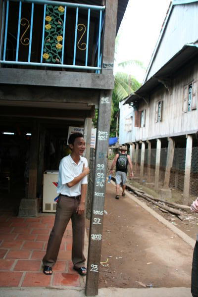 Village Bordering The Mekong