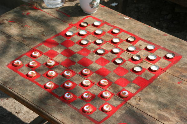 Game Of Draughts, Using Beer Bottle Lids As Pieces