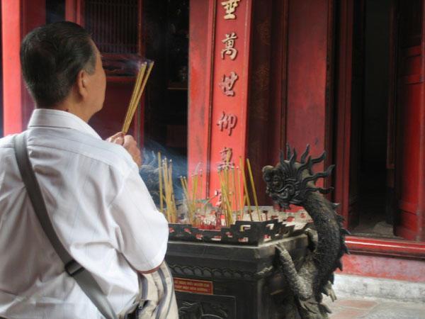 Prayer at one of Hanoi's many pagoda's