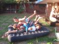 Dog pile on Cheryl during our day Braai