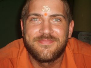 Brian marked with the typical markings received after being blessed in a Hindu Temple