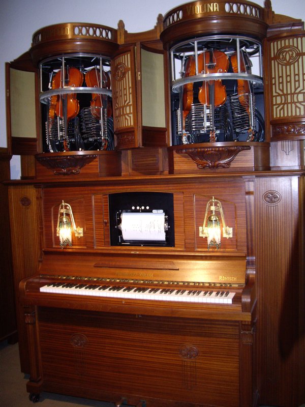 Seigfreid's Mechanical musical instruments - pianola with violins...