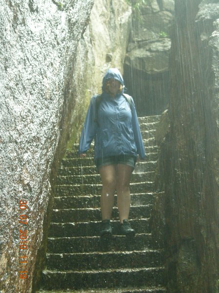 getting caught in the rain while walking down millions of steps!