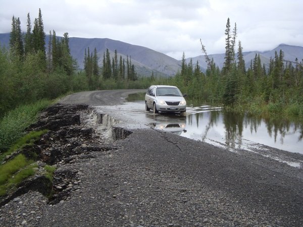 The road got slosed here after we passed. evidently washed right out!