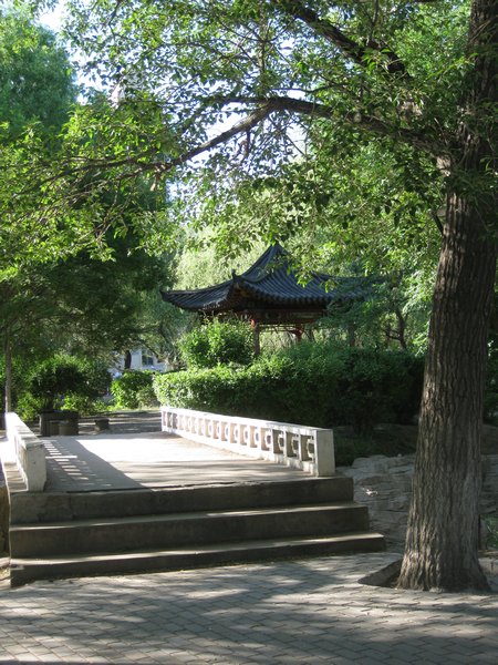 Bridge with pavilion in background
