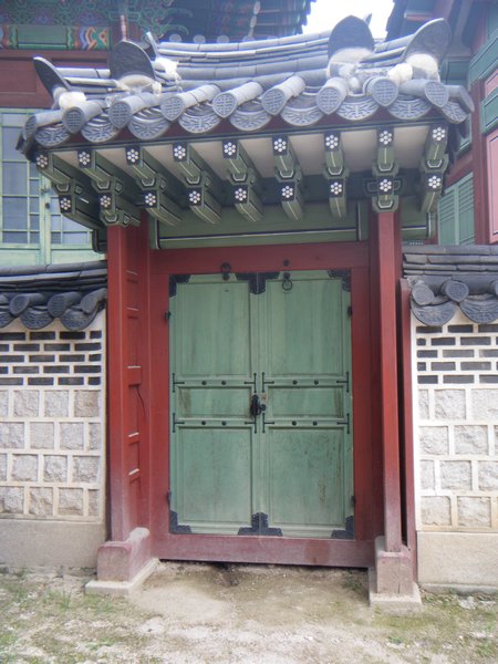 Door, with its own roof. 