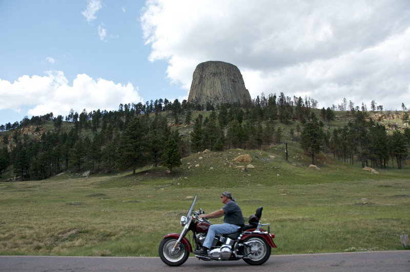 Devil's Tower and a biker