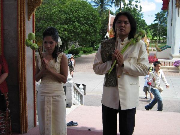 Thai couple praying