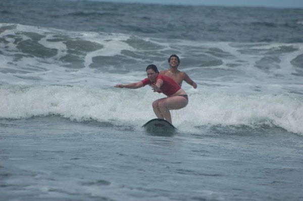 Heloise surfs