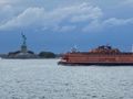 View of the Staten Island ferry heading the opposite way