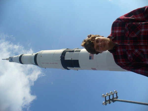Luke in front of a Saturn V Rocket