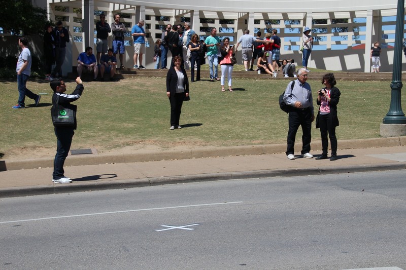 Kerrys standing on the Grassy Knoll (note the X on the road where JFK was killed)