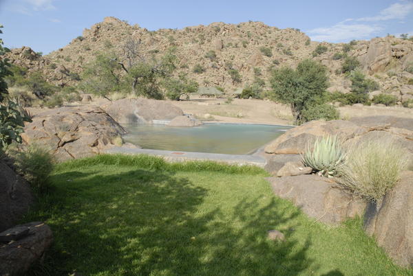 With natural swimming pool....