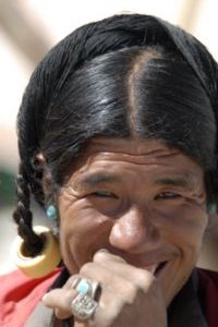 Traditional hairstyle of many tibetan men...