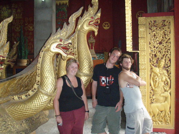 Keirra, Matt and Dougal inside Wat Xieng Thong